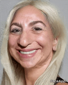 a close up of a woman 's face with the faceapp app visible