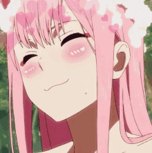 a girl with pink hair and hearts on her face is smiling