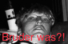 a black and white photo of a man with glasses and the words bruder was written in red