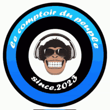 a monkey wearing headphones and sunglasses is in the center of a circle that says ce comptoir du peuple