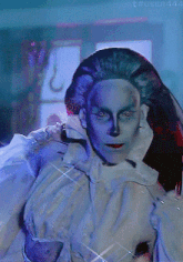 a gif of a woman with a ghostly look on her face has the hashtag user444 on the bottom