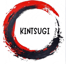 a red and black circle with the word kintsugi in the middle