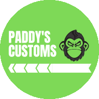 a green logo for paddy 's customs with a monkey head