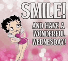 a picture of betty boop with the words `` smile and have a wonderful wednesday '' .