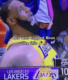 a basketball player from the los angeles lakers is being examined by a doctor