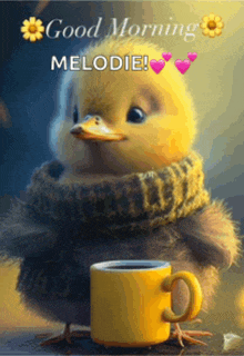 a duck with a scarf around its neck is holding a yellow cup of coffee