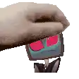a pixelated image of a hand holding a card with a picture of a man on it .