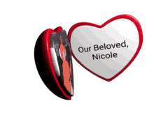 a red and white heart with our beloved nicole on it