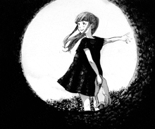 a girl in a black dress is standing in a tunnel