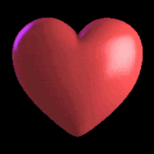 a red heart with snowbear written in red letters