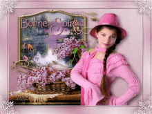 a woman in a pink dress is standing in front of a sign that says " bonne soiree "