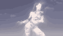 a naked woman is dancing in the clouds in a cloudy sky .