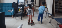 a little girl rollerblading in a living room with a cat