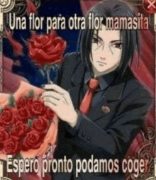 a man in a suit is holding a bouquet of red roses .