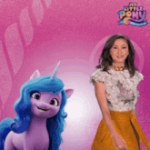 a woman standing next to a purple pony with the words my little pony g5 on the bottom