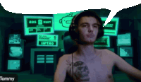 a shirtless man wearing headphones stands in front of a screen that says bug hunt