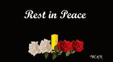 a sign that says rest in peace with roses and candles