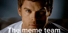 a close up of a man 's face with the words " the meme team " below him