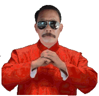 a man with a mustache wearing a red shirt and sunglasses