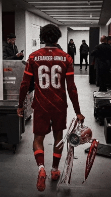 a soccer player with the name alexander-arnold on the back of his jersey