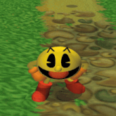 pac man is walking along a path with a yellow ball in the background