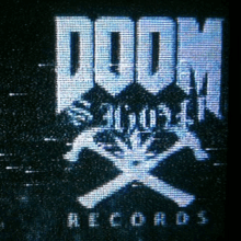 the logo for doom records is displayed on a black screen