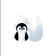 a pair of nails with a penguin and snowflakes