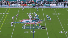 a football game between the dolphins and atl