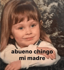 a picture of a little girl with the words abuelo chingo mi madre on the bottom