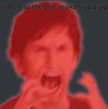 a picture of a man screaming with the words " when someone wakes you up " below him