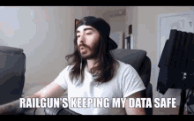 a man with long hair and a beard says railgun 's keeping my data safe in a video