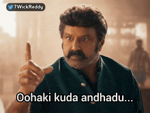 a man with a mustache is pointing up with the words oohaki kuda andhadu below him