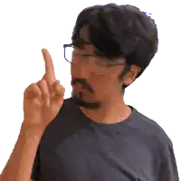 a pixelated image of a man wearing glasses pointing upwards