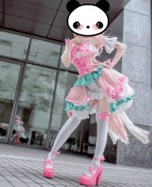 a woman in a pink and white dress with a panda on her face