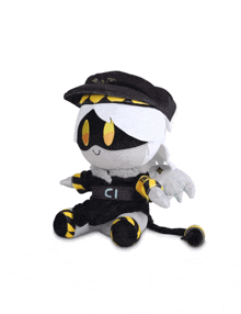 a stuffed animal with a black hat and a belt that says ci