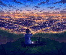 a girl sits on a bench with a cat looking at a city lit up at night