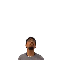 a man looking up at the number 16