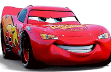 lightning mcqueen from the movie cars is smiling and looking at the camera