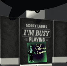 a black shirt that says sorry ladies i 'm busy = playing