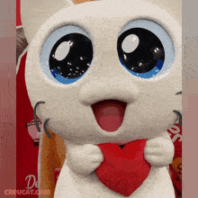 a white cat mascot holding a red heart with the website creucat.com in the background