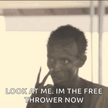 a silhouette of a man with a finger in his nose and the words look at me im the free thrower now