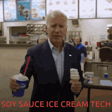 a man in a suit is holding an ice cream cone and a cup of soy sauce ice cream tech