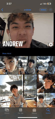 a phone screen shows a photo of andrew