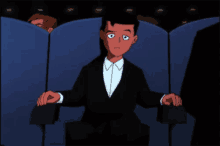 a cartoon of a man in a tuxedo sitting in a theater seat