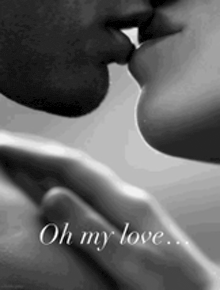 a black and white photo of a man and woman kissing with the words oh my love written below them