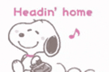 snoopy is holding a briefcase and smiling with the words `` headin ' home '' behind him .