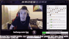 a man with headphones is on a screen that says ' grossgore ' at the top