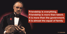 a man in a tuxedo is holding a rabbit and a quote from the godfather .