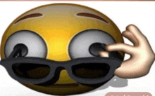 a cartoon smiley face wearing sunglasses and a hand