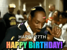 snoop dogg is celebrating his 27th birthday with confetti on his face